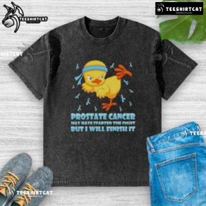 Cartoon chick in a karate kick pose on a washed t-shirt, symbolizing the fight against prostate cancer.