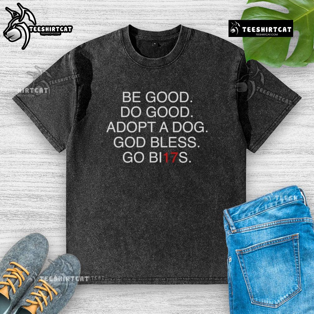 Adopt a dog message on a washed t-shirt featuring a positive slogan and playful design, perfect for dog lovers.
