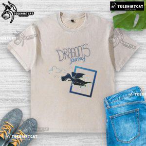 Alt Text: Cartoon fantasy dragon flying on a washed t-shirt, showcasing a vibrant design from Nice Dragon's Journey.
