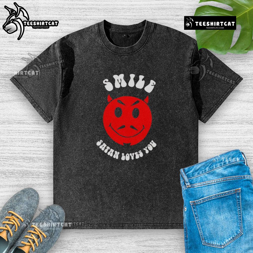 Nice Smile Satan Loves You washed t-shirt featuring a playful design and vibrant colors for casual wear.