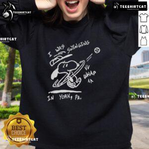 Cozy Nice Snoopy I Was Swinging In York sweatshirt featuring a playful Snoopy design, perfect for casual outings.
