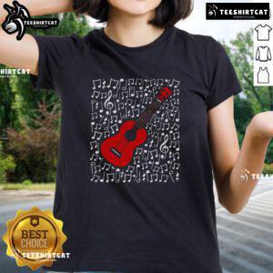 Woman playing ukulele surrounded by musical notes, promoting a nice ukulele tee for music teachers and musicians.