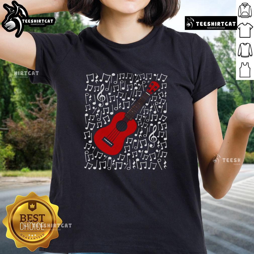 Woman playing ukulele surrounded by musical notes, promoting a nice ukulele tee for music teachers and musicians.