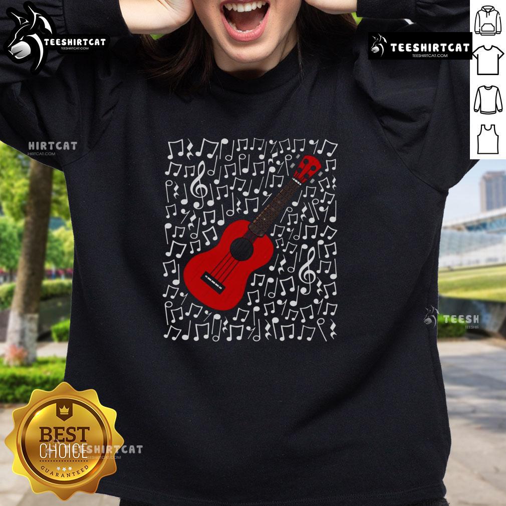 Musician wearing 'Nice Ukulele' sweatshirt, playing ukulele with musical notes in the background, perfect for music teachers.