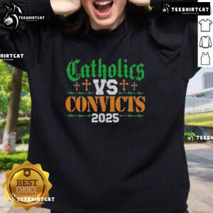 Official Catholics vs Convicts 2025 Sweatshirt featuring bold graphics and vibrant colors for fans and supporters.