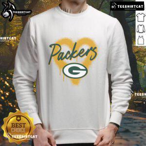 Alt Text: Official Green Bay Packers Football Spray Heart Sweatshirt in green with heart design, perfect for fans and game day wear.