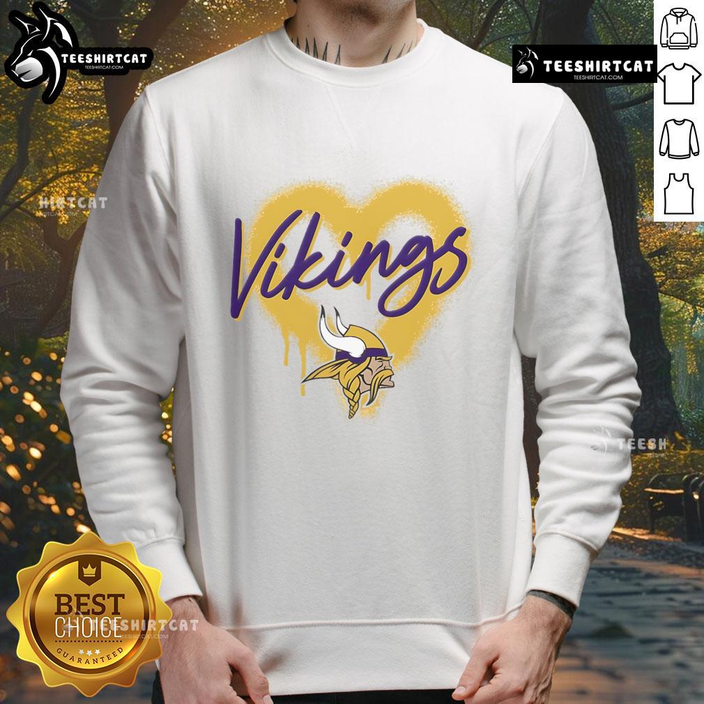 Alt Text: Official Minnesota Vikings Football Spray Heart Sweatshirt featuring a stylish design in team colors for fans.