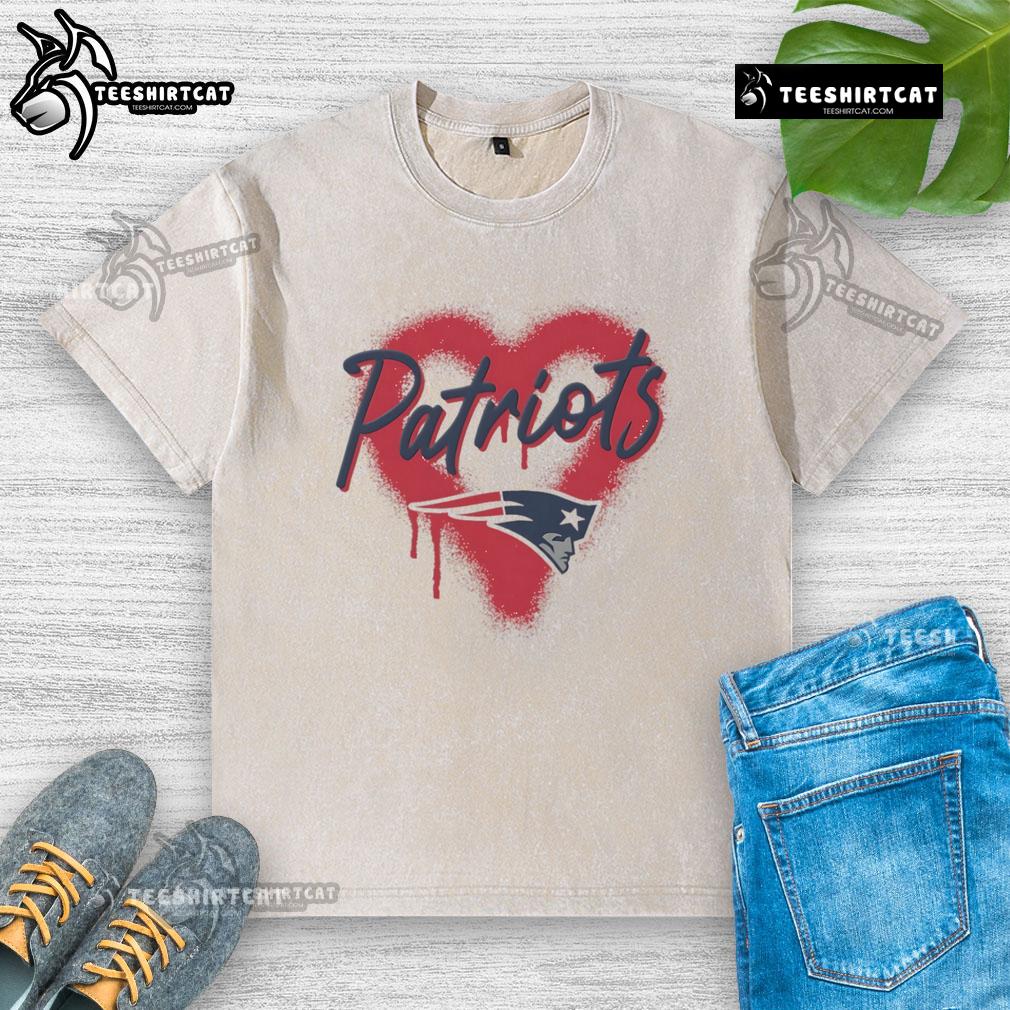 Alt Text: Official New England Patriots Football Spray Heart Washed T-Shirt featuring team colors and logo for fans.