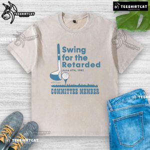 Official Swing For The Retarded Committee Member washed t-shirt featuring a humorous design and vibrant colors.
