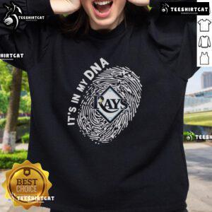 Alt Text: Official Tampa Bay Rays In My DNA sweatshirt showcasing team logo and vibrant colors, perfect for fans.