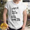 Joey Valence wearing a 'Free Your Mind Kill Your Ig' T-shirt, showcasing his unique style and artistic expression.