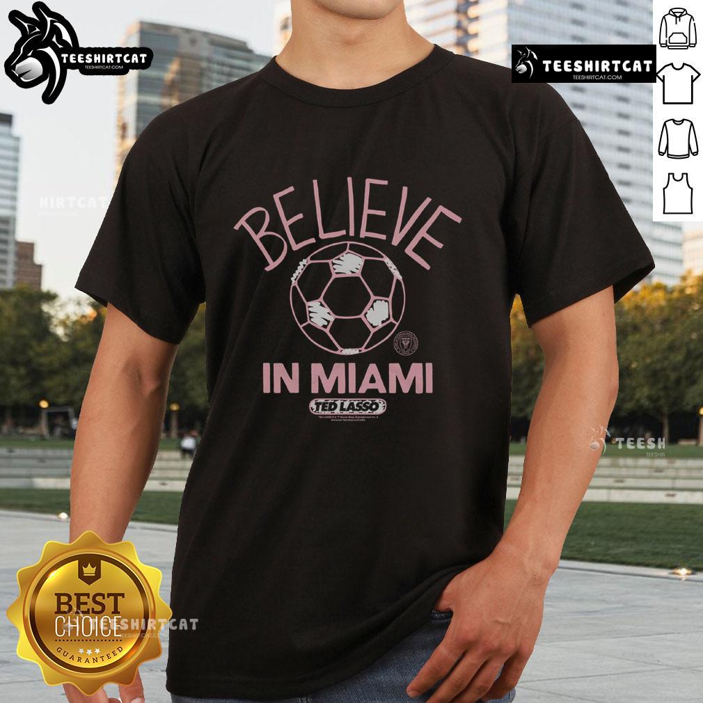 Alt Text: Premium Inter Miami CF Homage MLS x Ted Lasso Believe T-shirt showcasing vibrant design and comfortable fit.