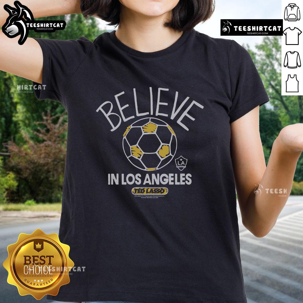 Premium LA Galaxy Homage MLS x Ted Lasso Believe Ladies Tee featuring vibrant design and comfortable fit for fans.