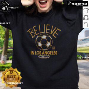 Premium LAFC Homage MLS x Ted Lasso Believe Sweatshirt featuring bold graphics and a cozy design for fans.