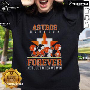 Premium peanuts sweatshirt featuring Charlie Brown, Snoopy, and Houston Astros - perfect for fans year-round.