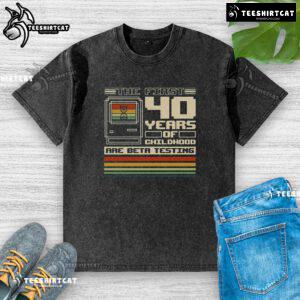 Premium washed t-shirt featuring 'The First 40 Years of Childhood' design, perfect for casual wear and nostalgic vibes.