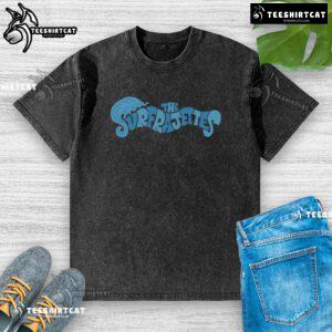 Alt Text: Premium The Surfrajettes wave logo washed t-shirt featuring a stylish design, perfect for surf and casual wear enthusiasts.