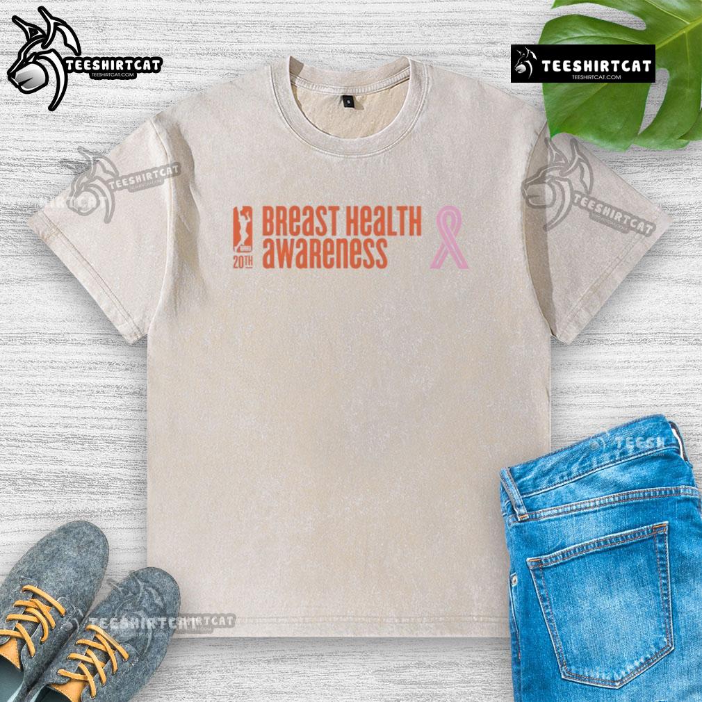 Alt Text: Premium WNBA Breast Health Awareness 20th Anniversary washed t-shirt showcasing vibrant design and supportive message.
