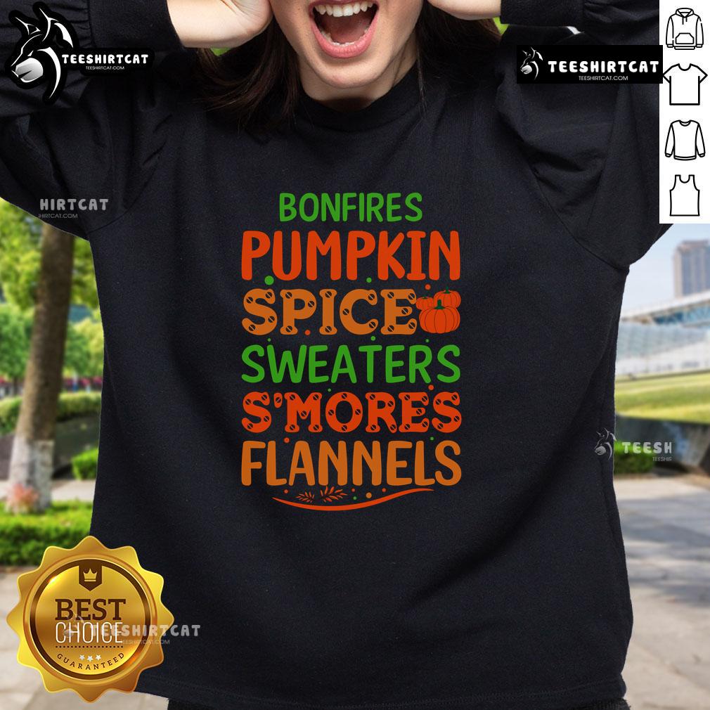 Cozy fall scene with pretty bonfires, pumpkin spice sweaters, and s'mores by flannel-clad friends wearing sweatshirts.