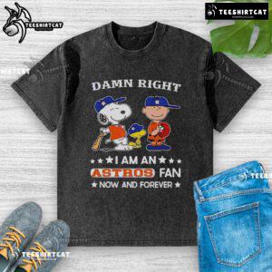 Astros fan Snoopy and Charlie Brown graphic on a washed t-shirt, showcasing team pride and playful design.