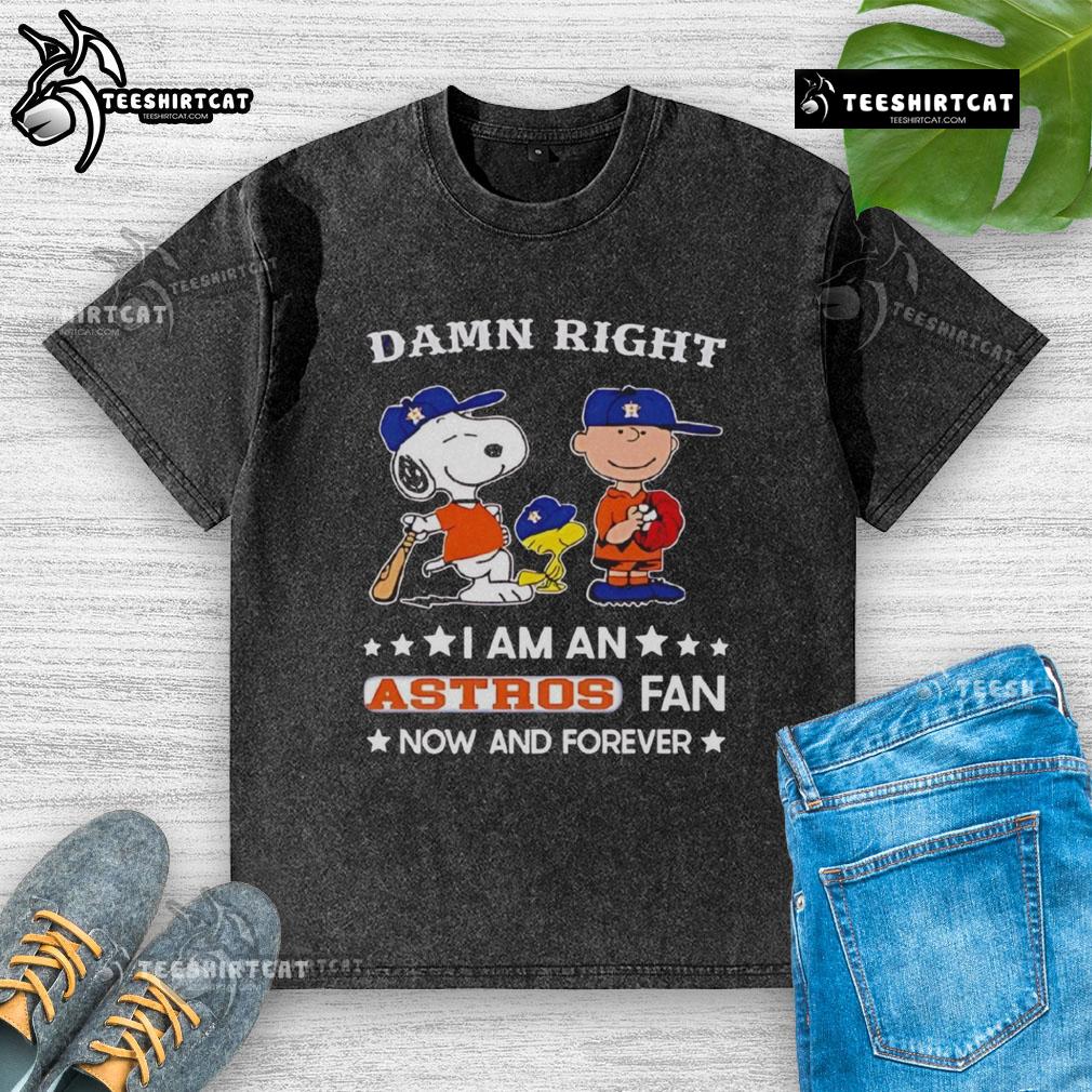 Astros fan Snoopy and Charlie Brown graphic on a washed t-shirt, showcasing team pride and playful design.