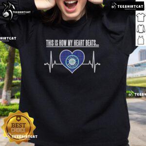 Seattle Mariners sweatshirt with 'Pretty-This-Is-How-My-Heart-Beats' design, perfect for fans and casual wear.