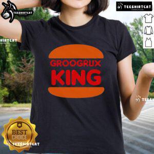 Top GrooGrux King logo on a stylish ladies tee, perfect for fans of the band and trendy casual wear.