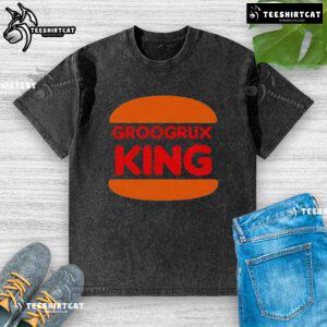 Top GrooGrux King logo on a washed t-shirt, showcasing a stylish and vibrant design for fans of the band.