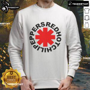 Alt Text: Stylish Top Red Hot Chilli Peppers sweatshirt featuring vibrant band logo design on soft fabric.