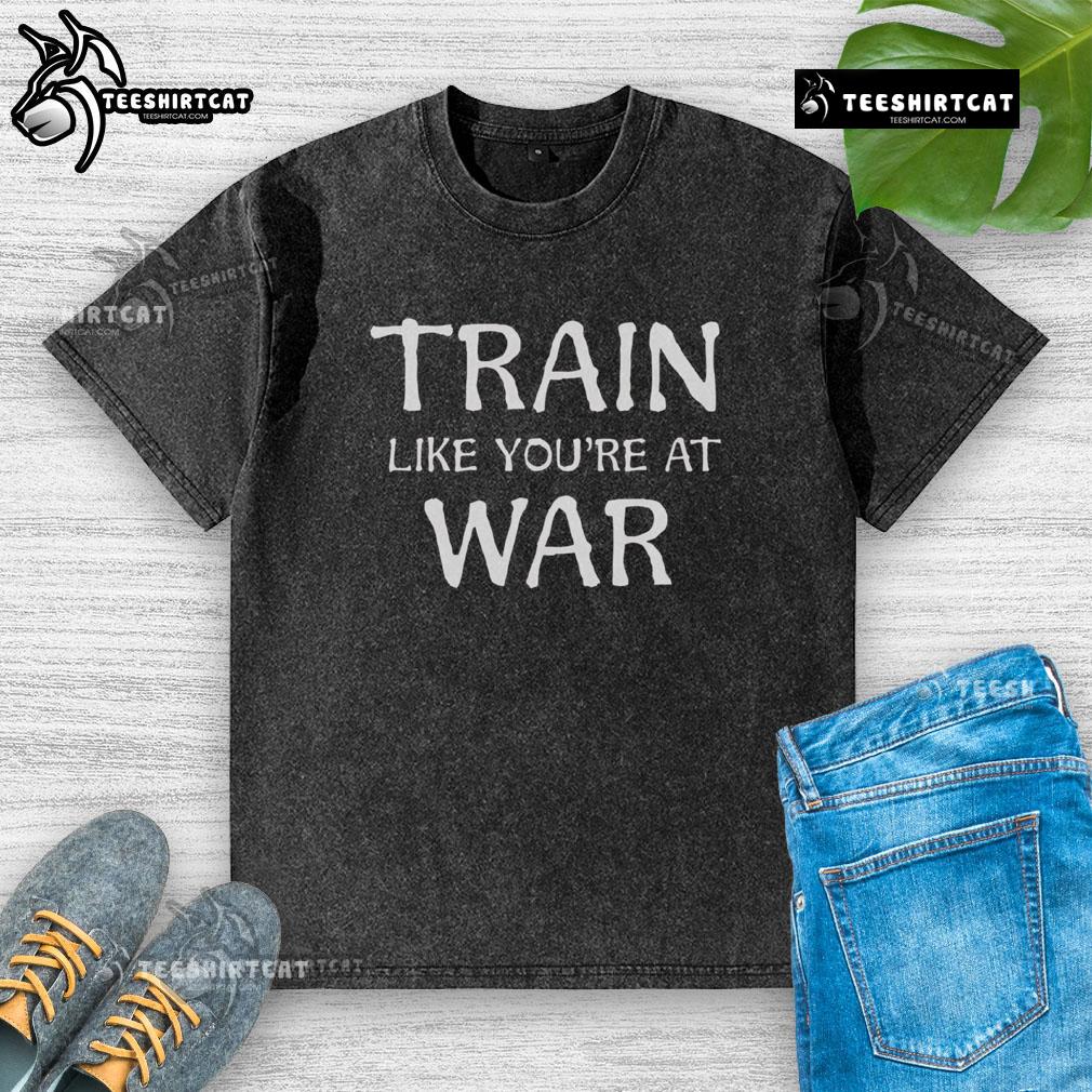 Top Train Like You're At War Washed T-Shirt featuring a bold graphic design on a comfortable, casual fit.