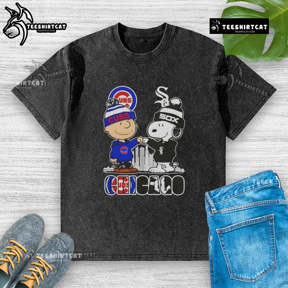 Cute Snoopy and Charlie Brown graphic on Chicago skyline washed t-shirt featuring Cubs and White Sox sports logos.