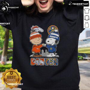 Alt Text: Cute Snoopy and Charlie Brown Denver Sports sweatshirt featuring Broncos and Nuggets skyline design.