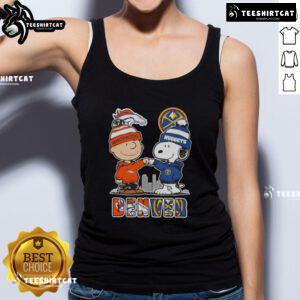 Alt Text: Cute Snoopy and Charlie Brown tank top featuring Denver sports teams Broncos and Nuggets skyline design.