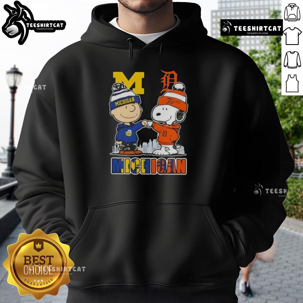 Cute Snoopy and Charlie Brown in Michigan sports hoodie featuring Wolverines and Detroit Tigers skyline design.