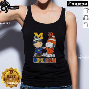 Cute Snoopy and Charlie Brown in Michigan sports Wolverine and Detroit Tigers tank top with skyline design.