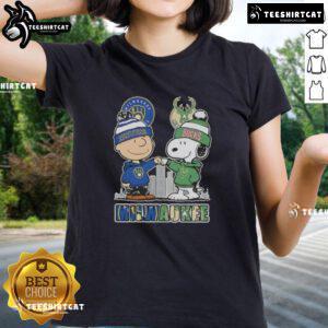 Cute Snoopy and Charlie Brown on Milwaukee skyline tee, celebrating Brewers and Bucks sports teams for ladies.