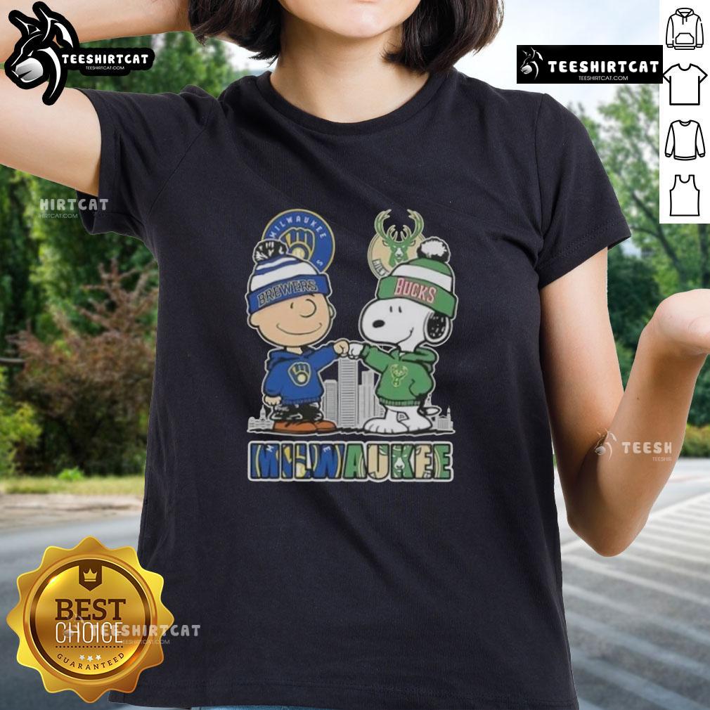 Cute Snoopy and Charlie Brown on Milwaukee skyline tee, celebrating Brewers and Bucks sports teams for ladies.