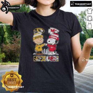 Alt Text: Cute Snoopy and Charlie Brown graphic on Missouri Tigers x Kansas City Chiefs skyline ladies tee shirt.