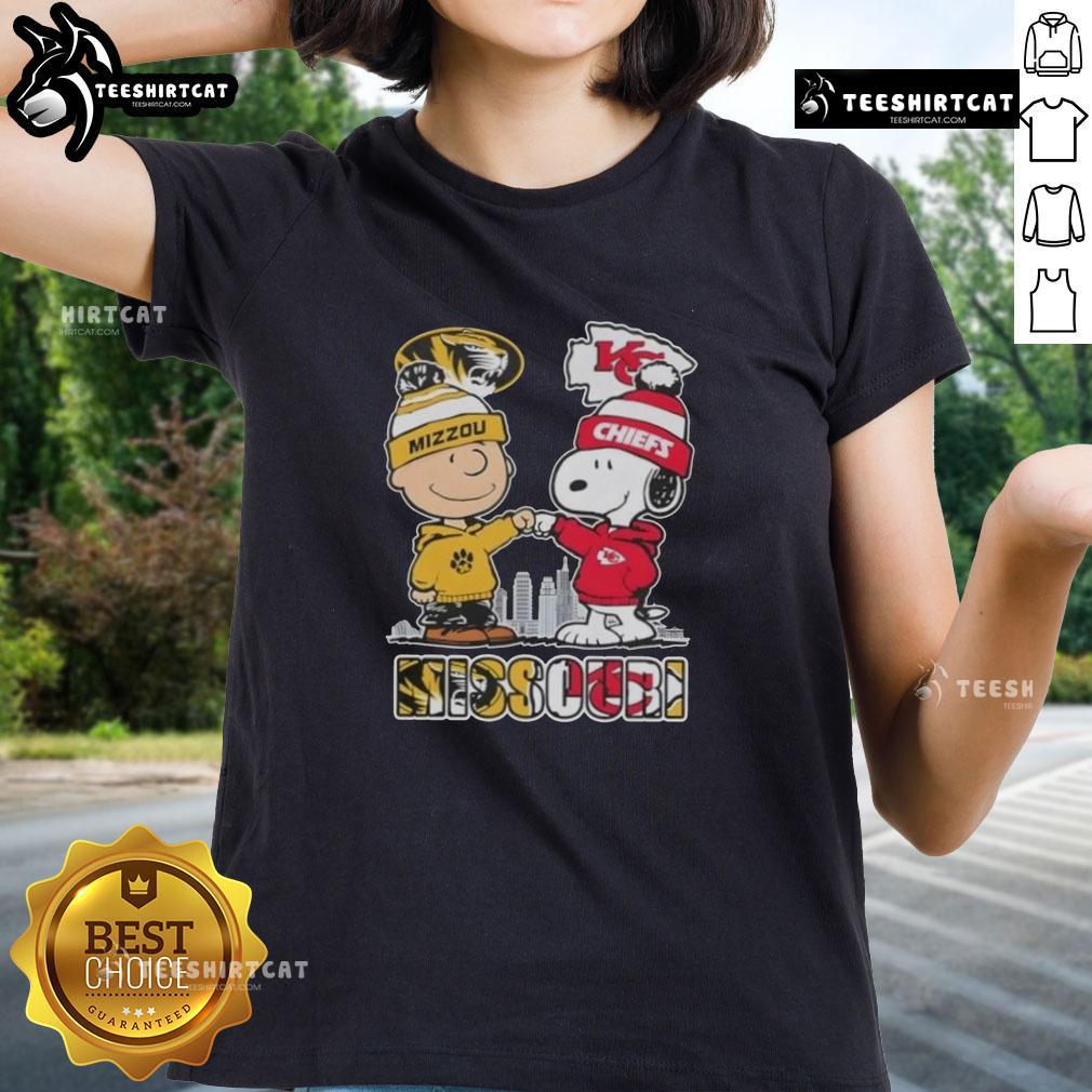 Alt Text: Cute Snoopy and Charlie Brown graphic on Missouri Tigers x Kansas City Chiefs skyline ladies tee shirt.