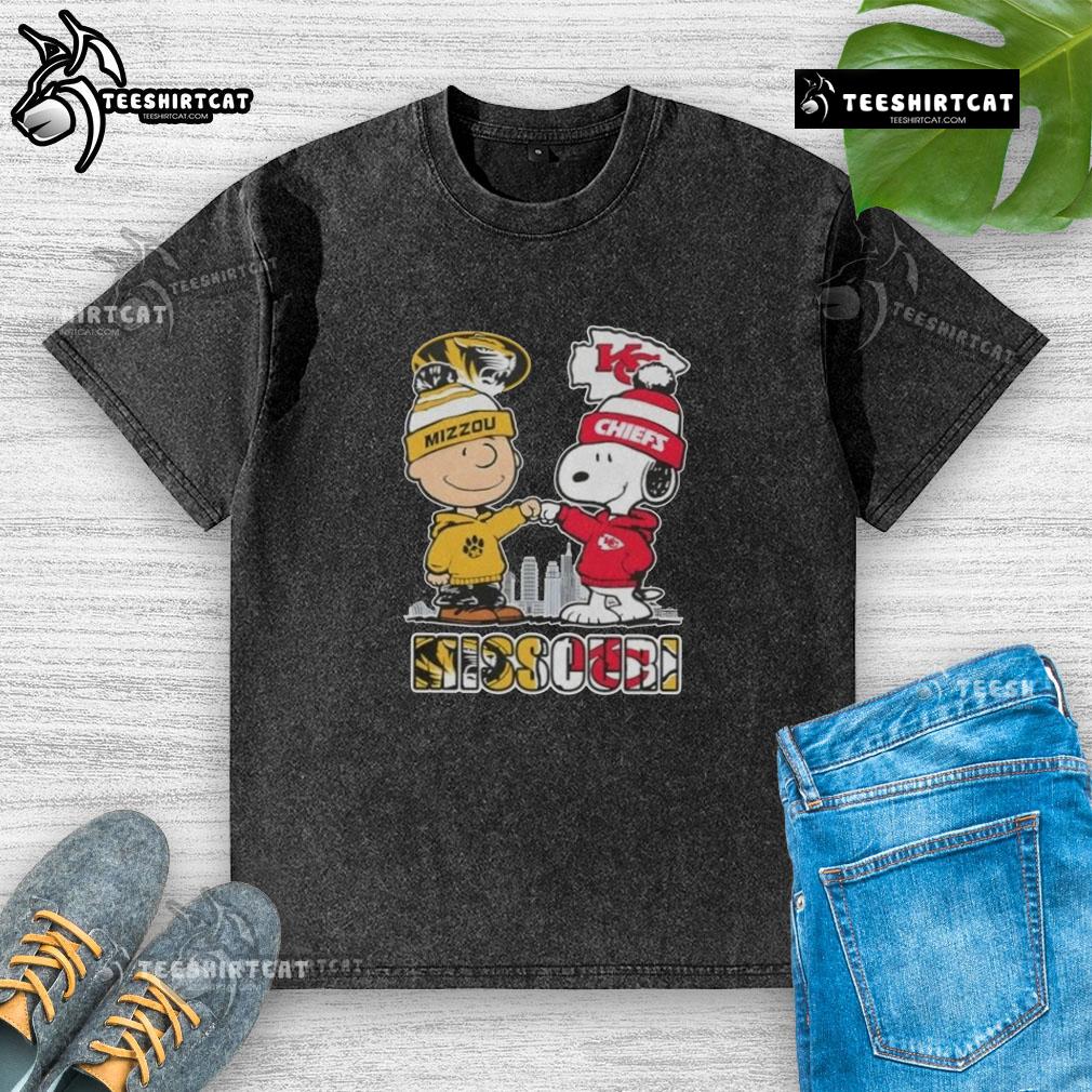 Alt Text: Cute Snoopy and Charlie Brown graphic on Missouri Tigers x Kansas City Chiefs skyline washed t-shirt.