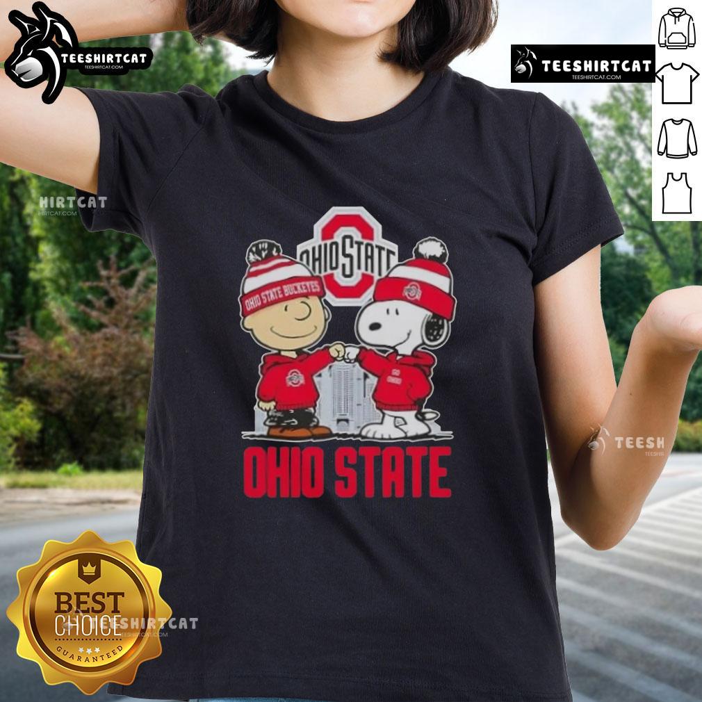 Alt Text: Cute Snoopy and Charlie Brown Ohio State Buckeyes football skyline ladies tee featuring fun cartoon design.