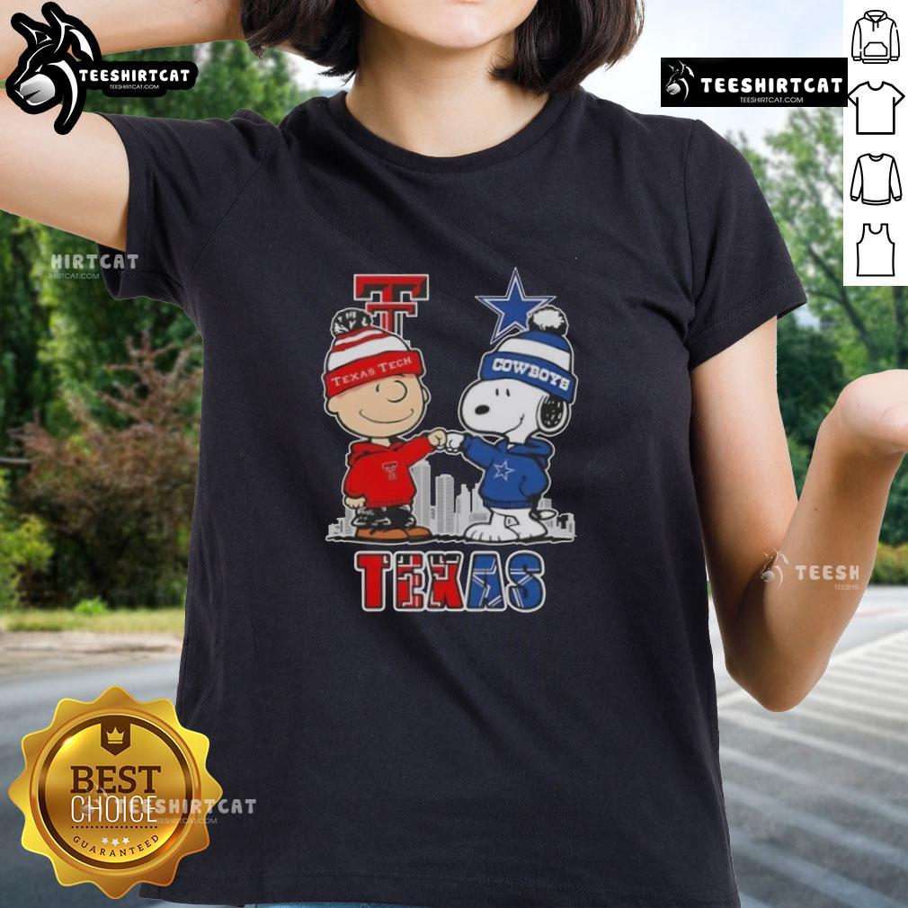 Alt Text: Cute Snoopy and Charlie Brown graphic on a Texas Tech Red Raiders vs. Dallas Cowboys skyline ladies tee shirt.