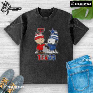 Alt Text: Cute Snoopy and Charlie Brown graphic on a Texas Tech Red Raiders X Dallas Cowboys skyline washed t-shirt.