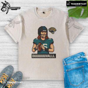 Alt Text: Funny Jacksonville Jaguars Duuuuuuvalll pixel art design on a washed t-shirt, perfect for fans and casual wear.