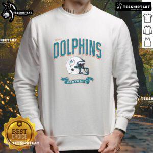 Alt Text: Distressed vintage sweatshirt featuring a Miami Dolphins football helmet design, perfect for fans and collectors.