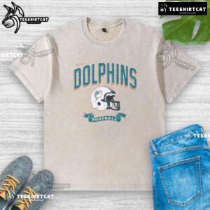 Distressed vintage washed t-shirt featuring a Miami Dolphins football helmet design, perfect for fans and collectors.