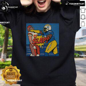 Good Teair Tart slapping Travis Kelce on a stylish sweatshirt, perfect for sports fans and trendy apparel lovers.