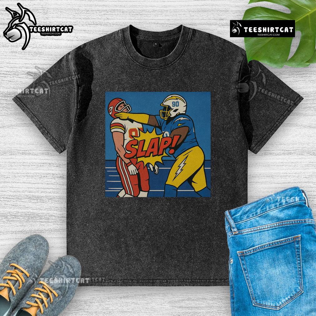 Good Teair Tart slapping Travis Kelce in a washed t-shirt, capturing a fun moment from pop culture.