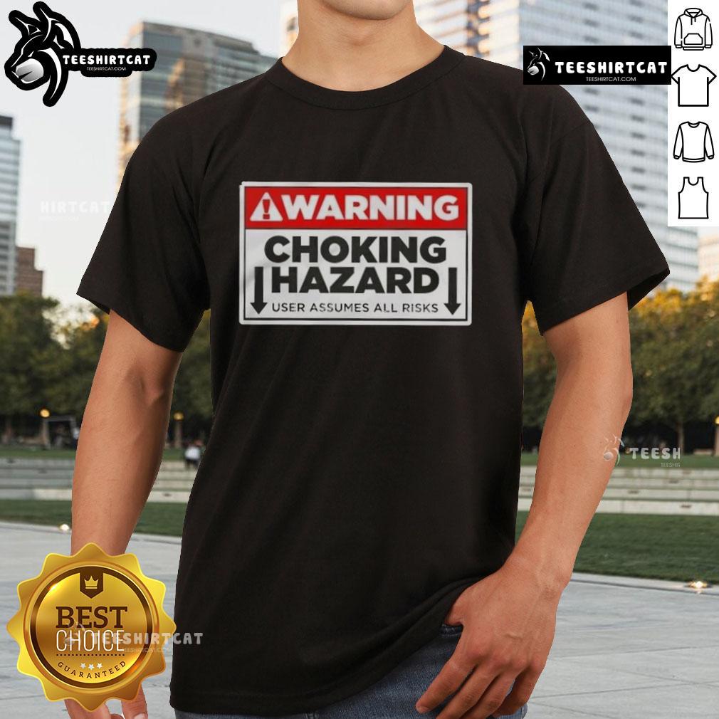 Good Warning Choking Hazard User Assumes All Risks T-Shirt featuring bold text and a playful design for safety awareness.