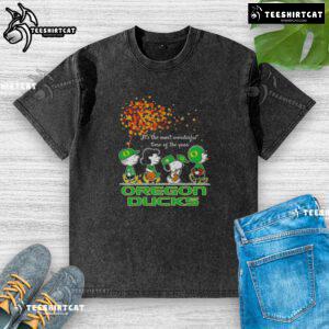 Happy Snoopy and friends wearing Oregon Ducks gear on an autumn washed t-shirt, celebrating the most wonderful time of the year.